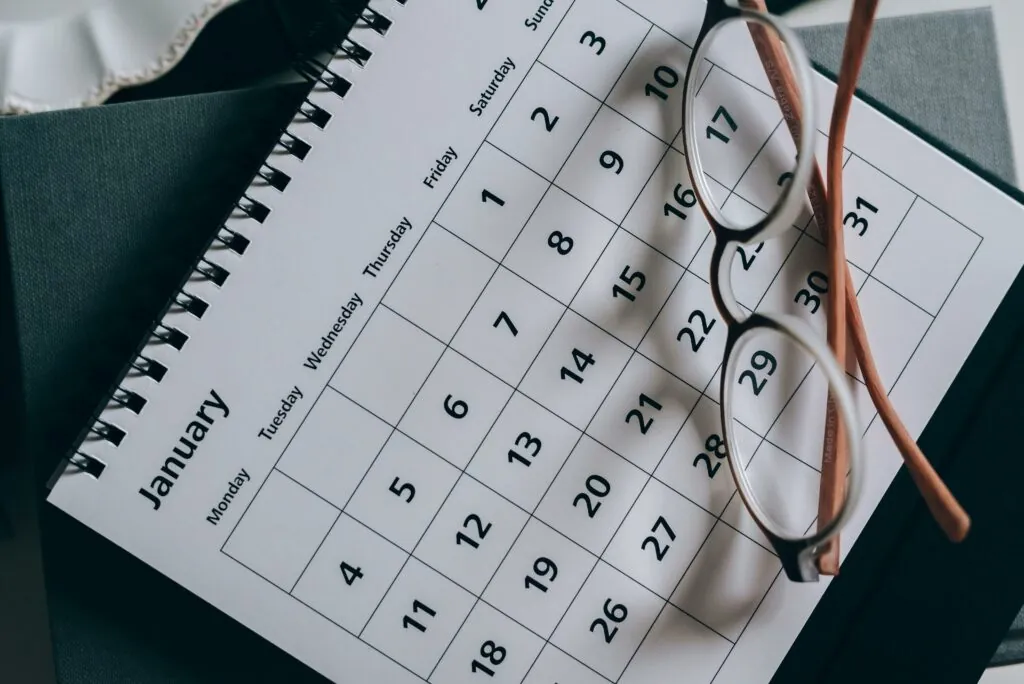 a calendar with glasses on it
